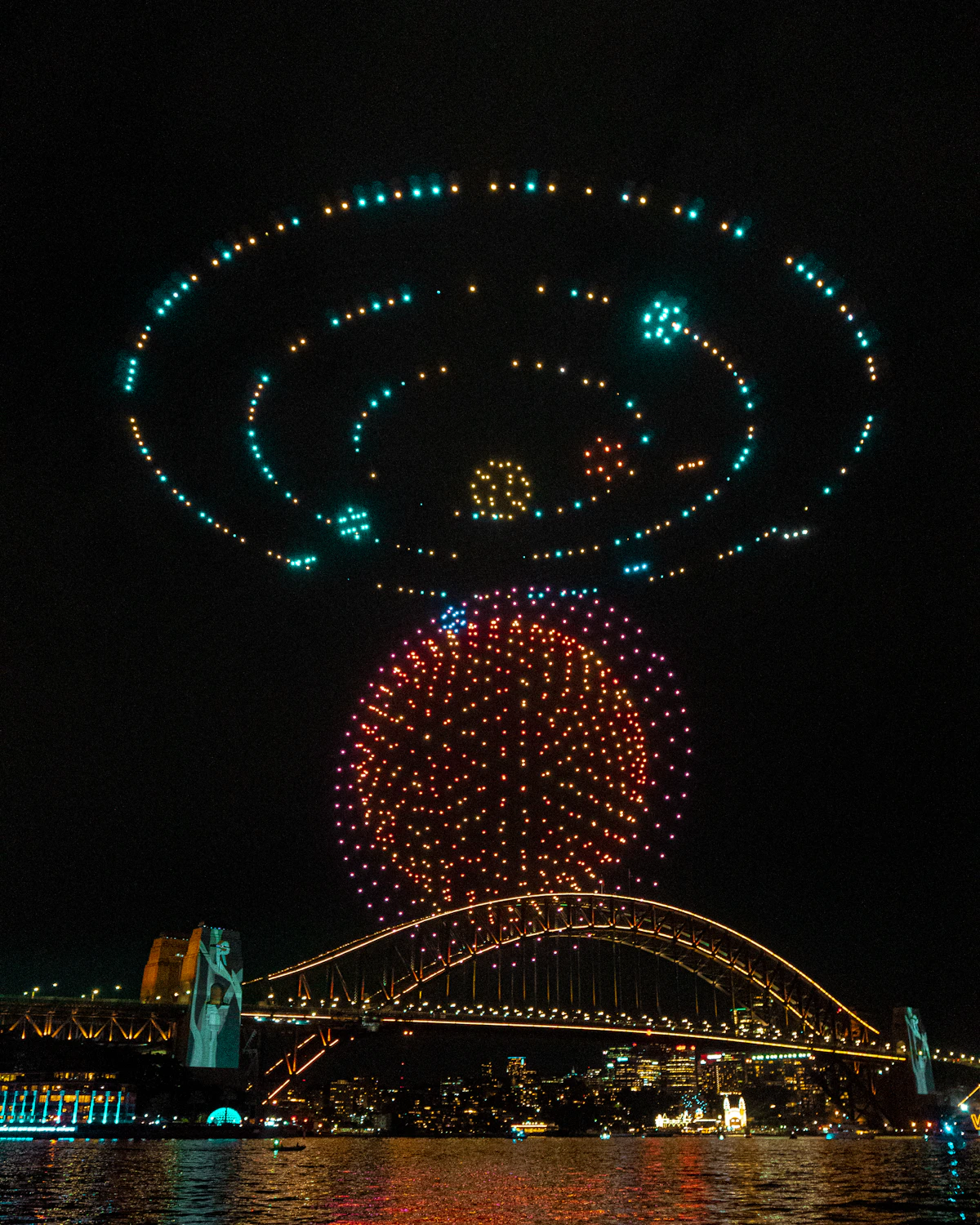 Drone light display over city