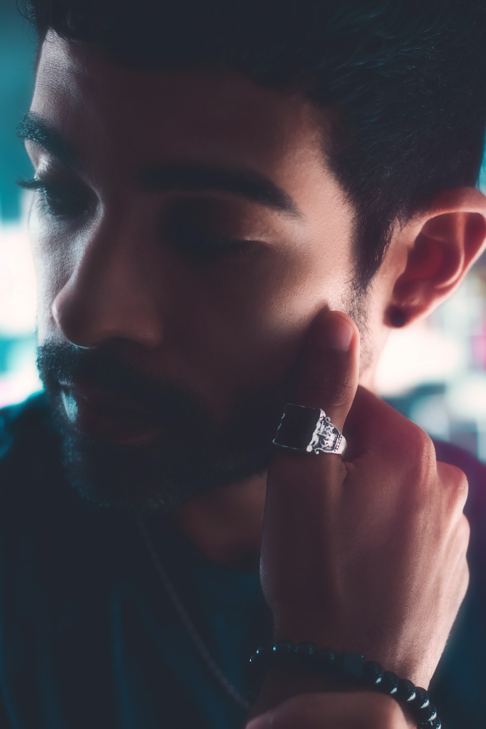 a man with a ring on his finger