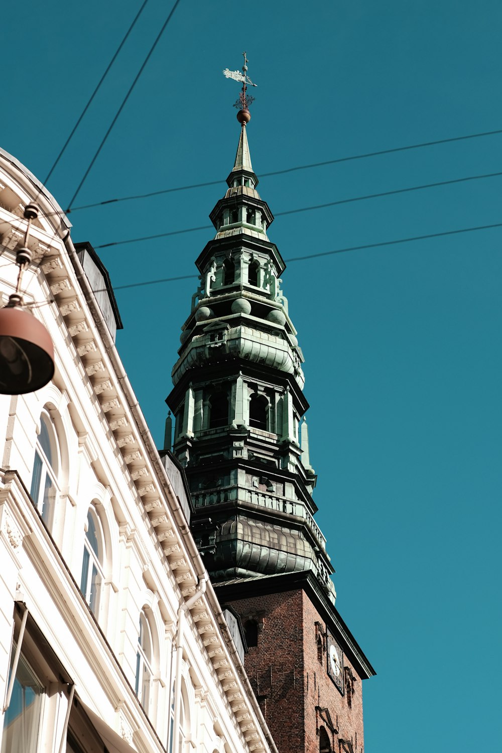 a tall building with a steeple on top of it