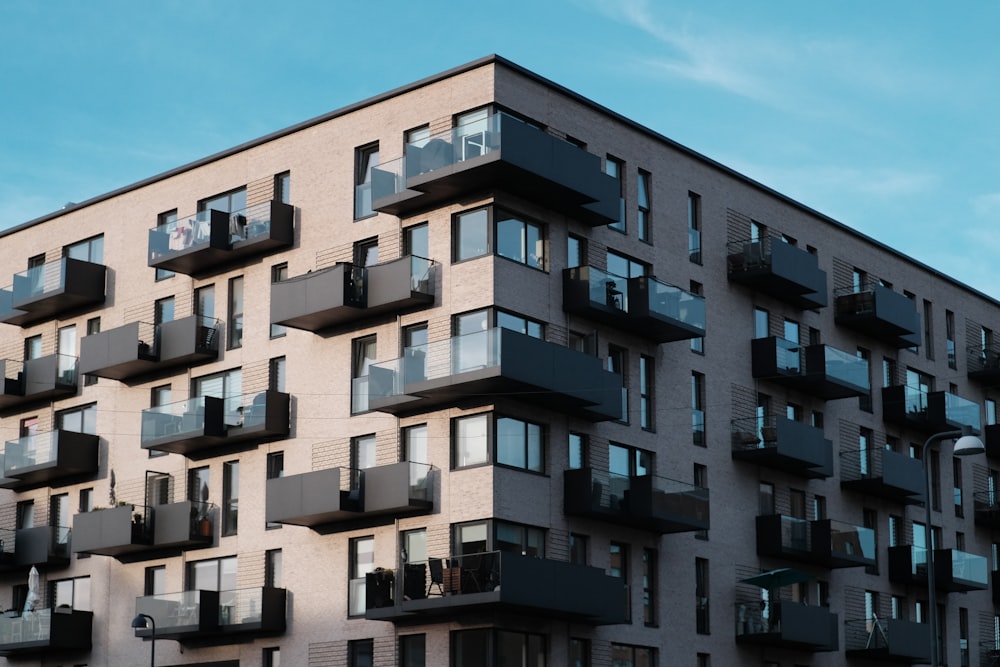 a tall building with balconies and balconies on the balconies