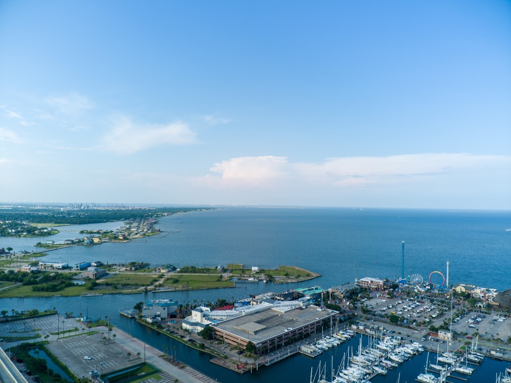 an aerial view of a marina with boats in the water