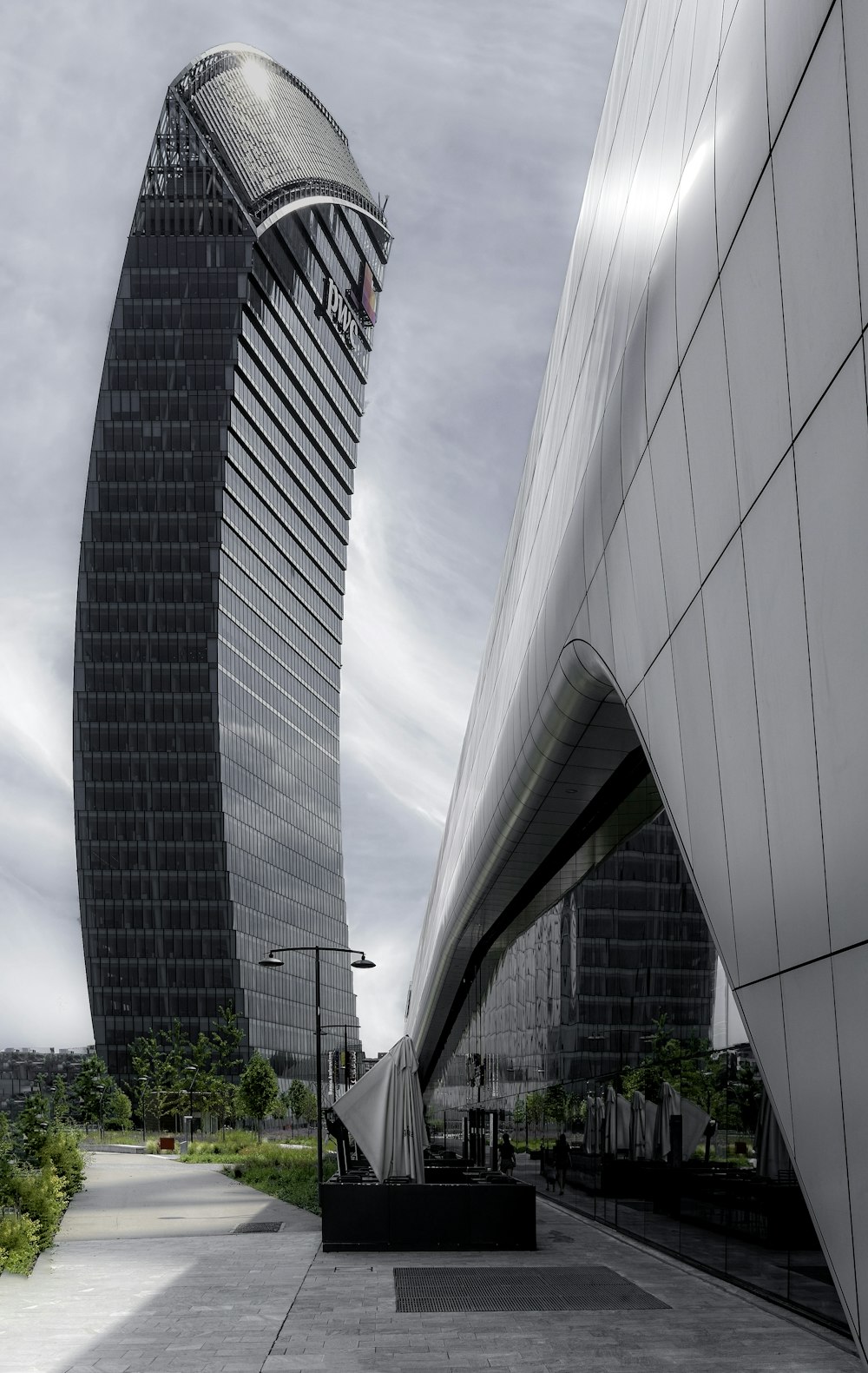 a very tall building with a curved roof