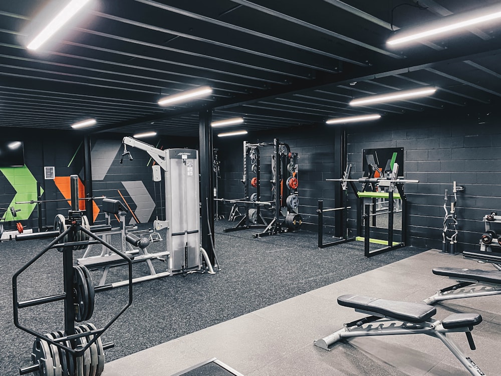 a gym filled with machines and weight machines
