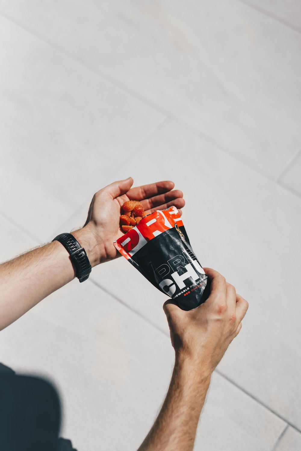 a person holding a can of food in their hand