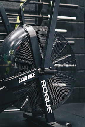 a close up of a bike with a fan on it