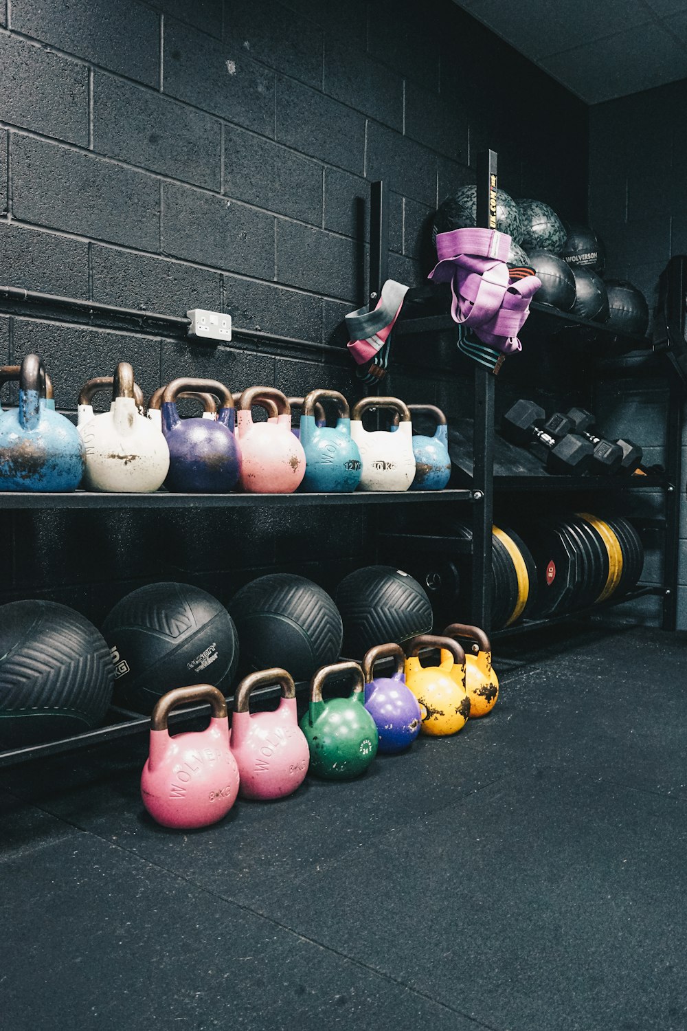 a row of kettles in a gym