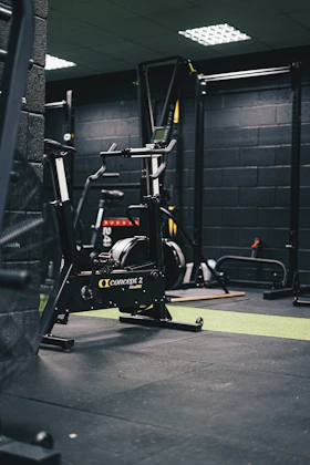 a gym with a machine and other equipment