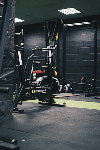 a gym with a machine and other equipment