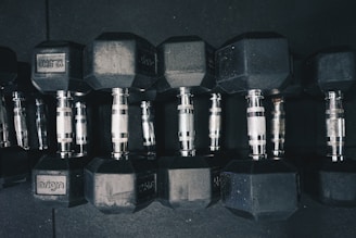 a row of dumbs sitting next to each other