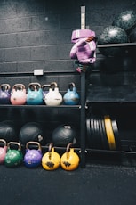 a rack of kettles and kettles in a gym
