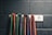 A close-up of colorful resistance bands neatly arranged on a gym floor.