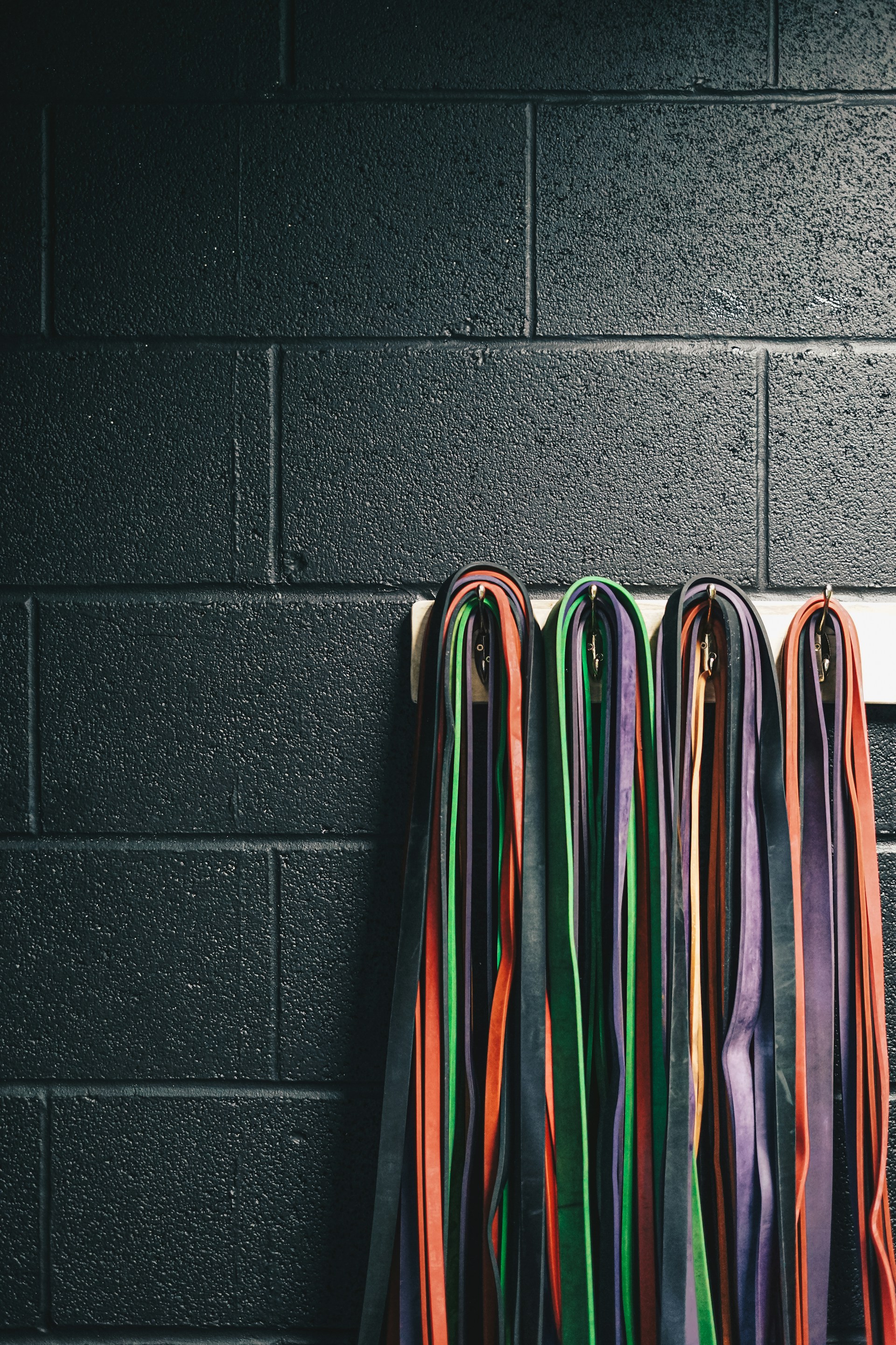 a row of ribbons hanging on a wall
