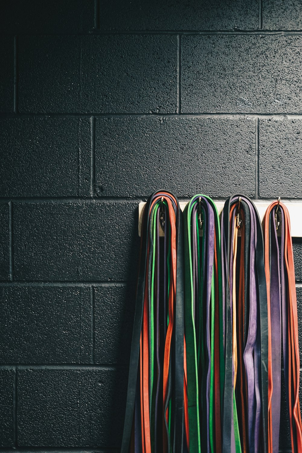 a row of ribbons hanging on a wall