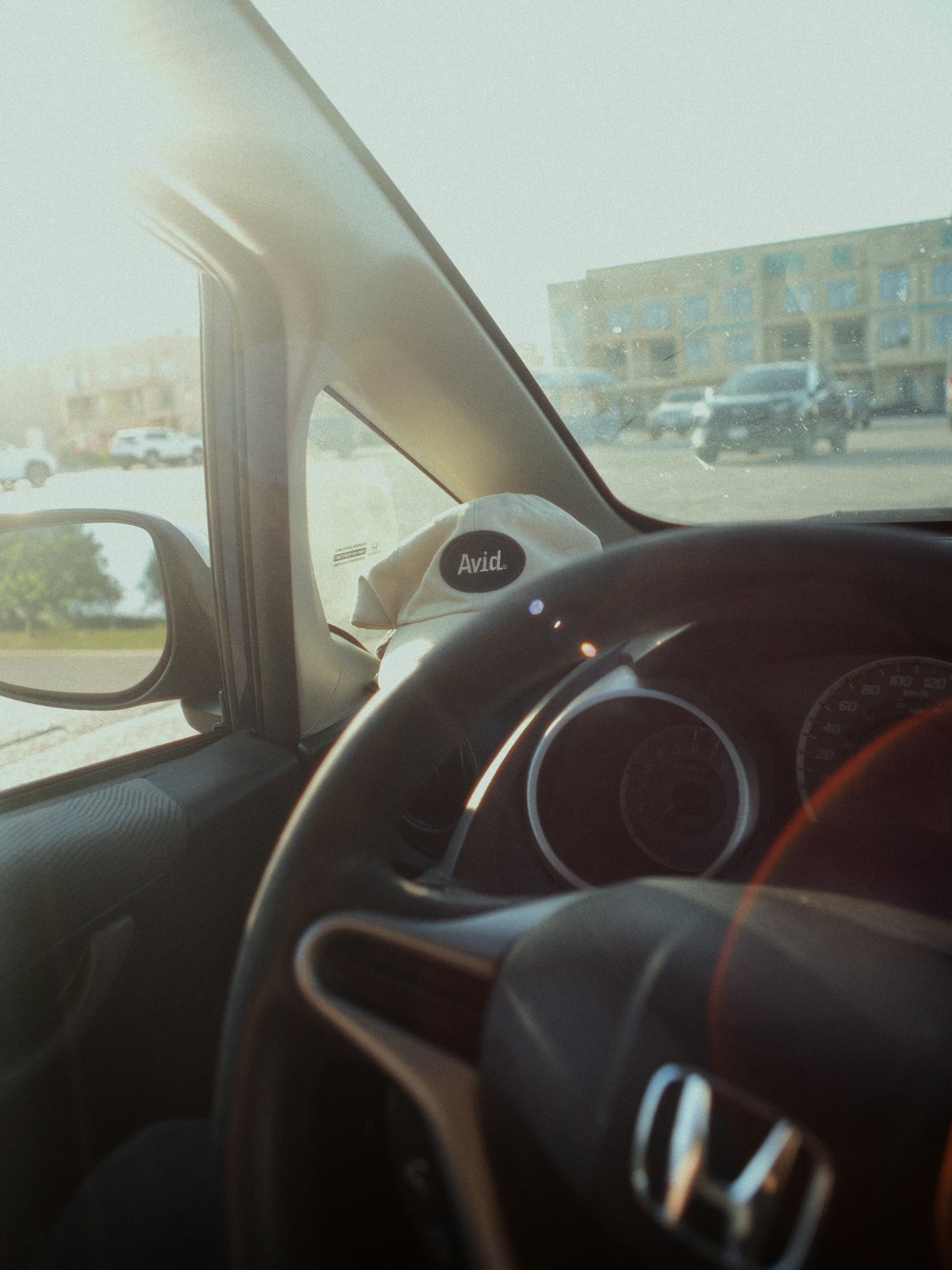 a view of the dashboard of a car from inside the vehicle