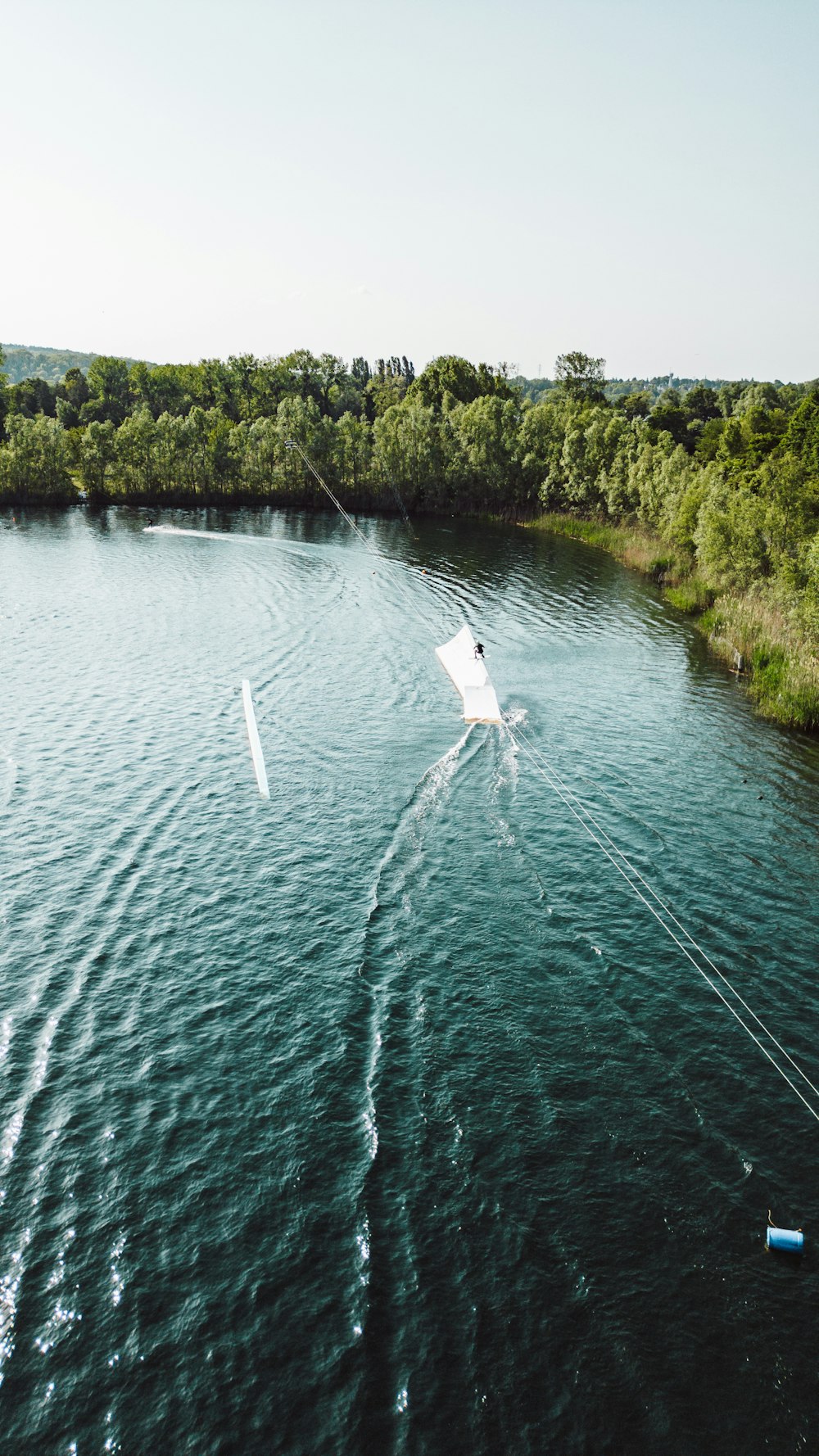 a person on a water ski being pulled by a boat