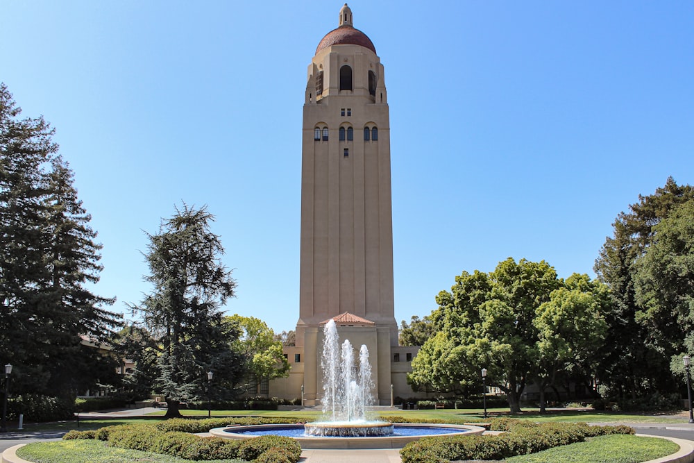 a tall tower with a clock on the top of it