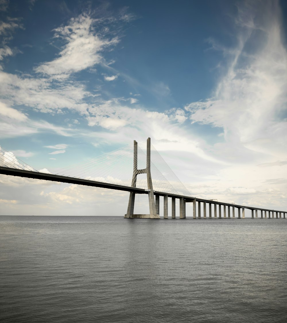 a large bridge spanning over a large body of water