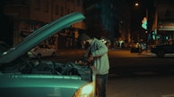 Technician responding to a 24/7 heating service call at night.
