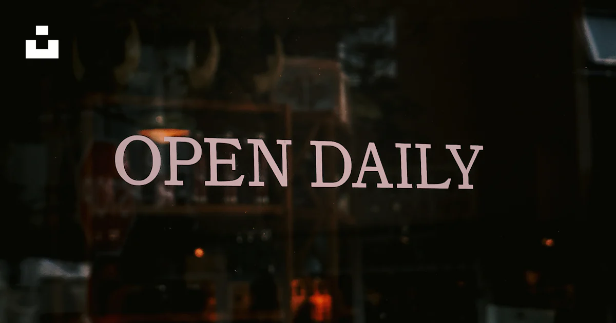An open daily sign is reflected in a window photo – Free City Image on ...