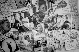 a refrigerator covered in lots of magnets and pictures
