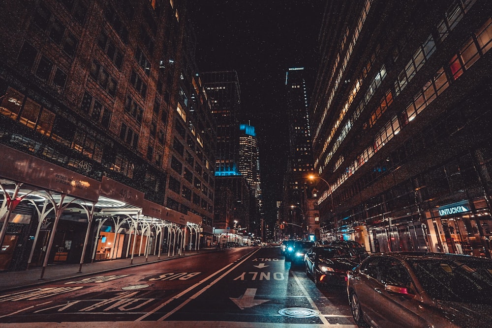 a city street filled with lots of tall buildings