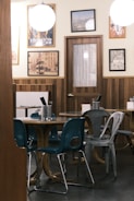 a dining room with a table and chairs