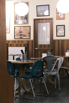 a dining room with a table and chairs