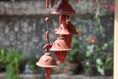 a group of bells hanging from a building