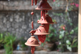 a group of bells hanging from a building