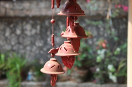 a group of bells hanging from a building