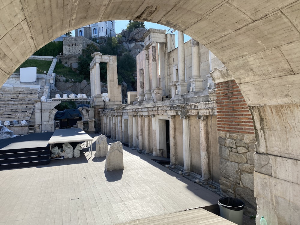 a view of a building from under a bridge