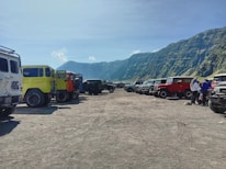 A lineup of recreational vehicles parked neatly, ready for deployment.