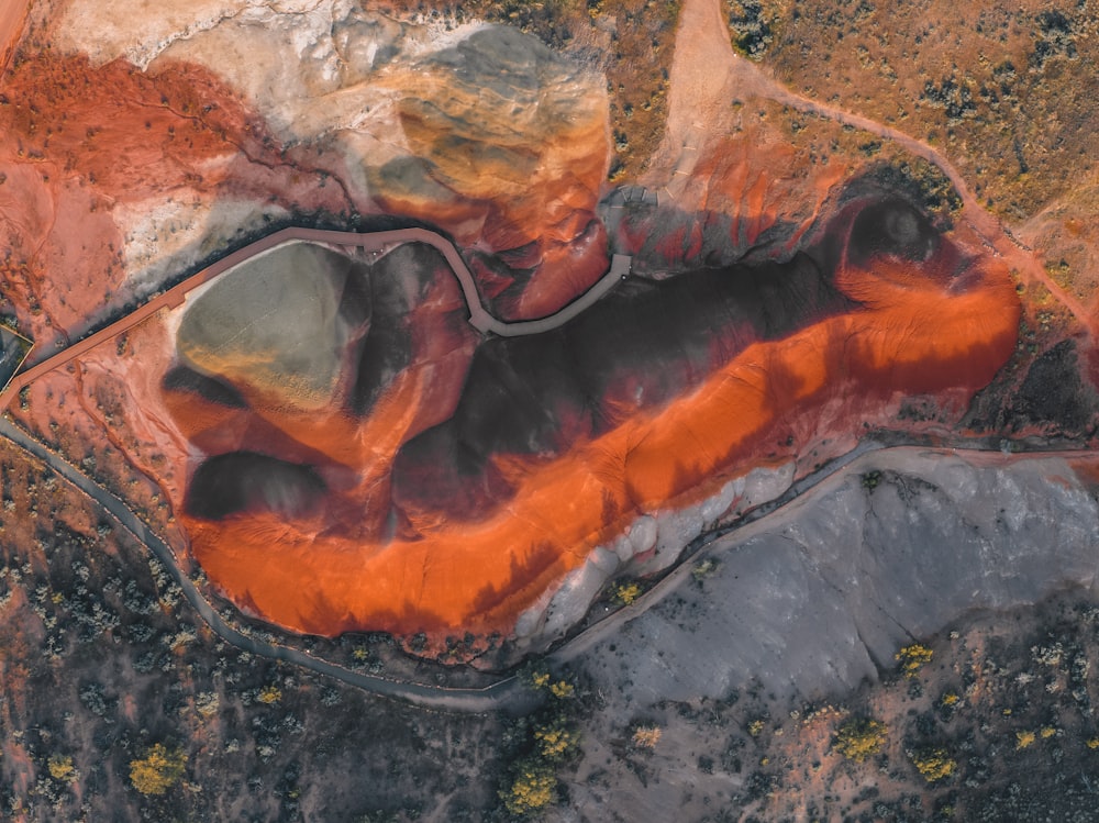 an aerial view of an orange and black area