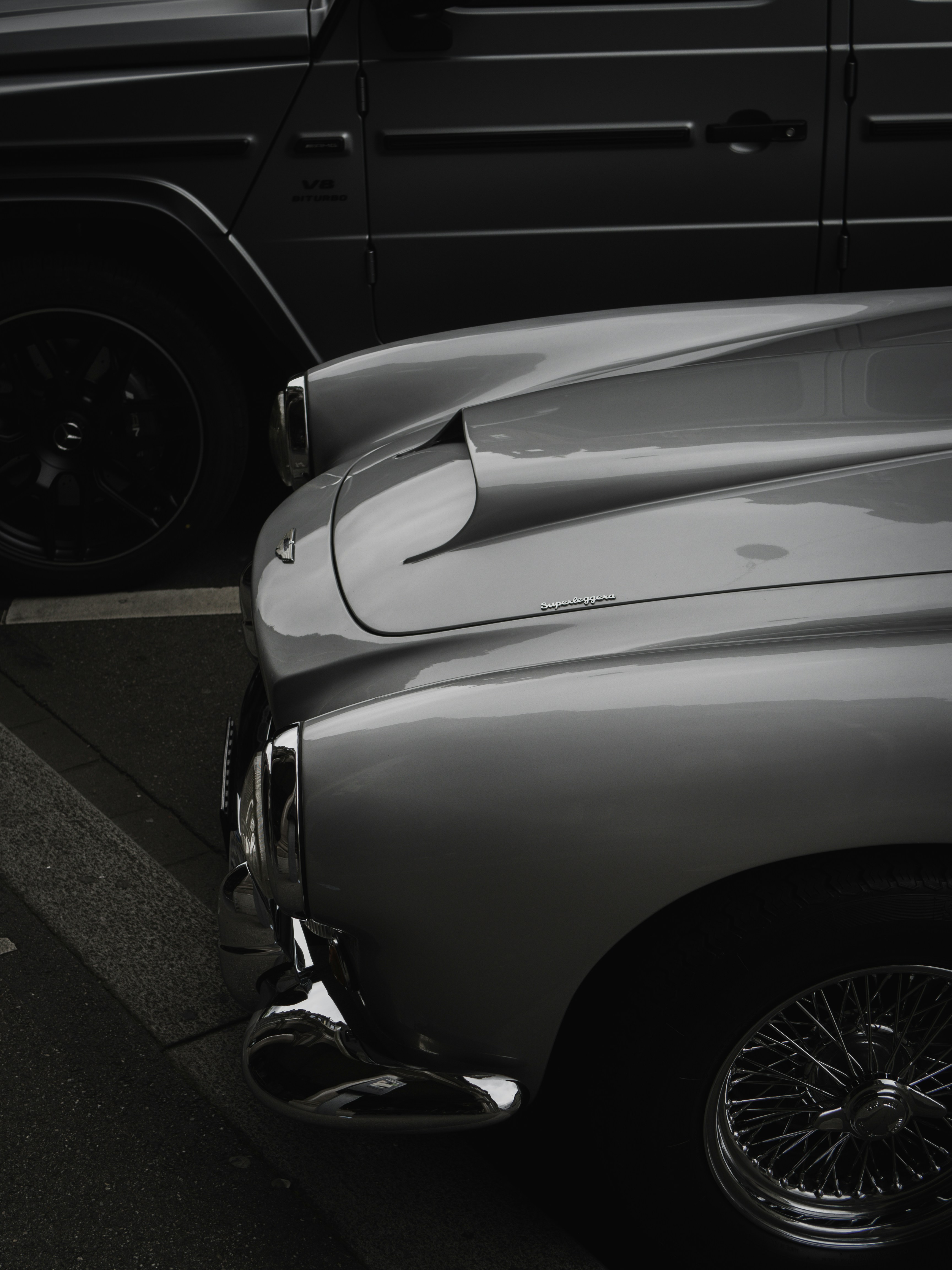 a couple of cars parked next to each other