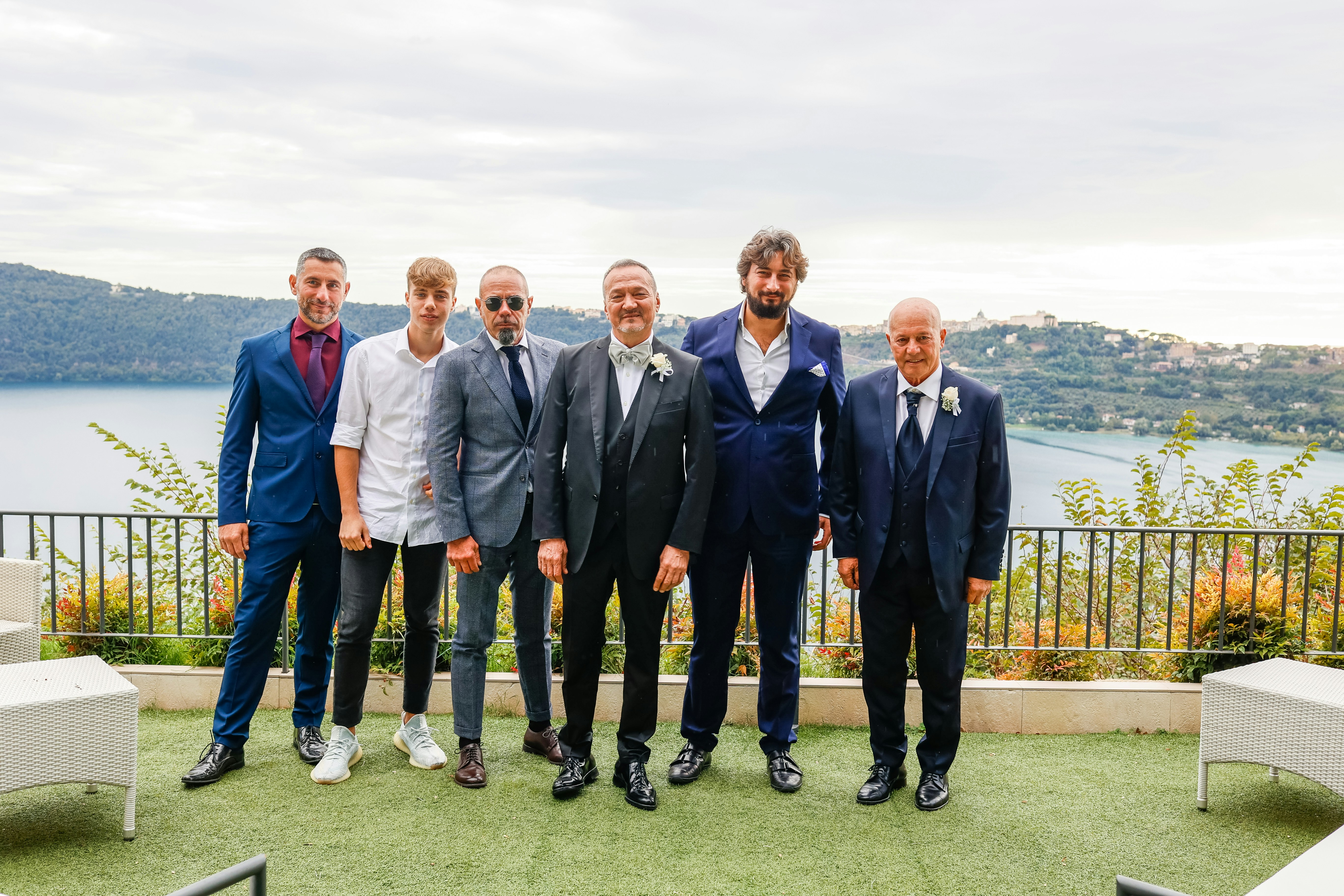 a group of men standing next to each other