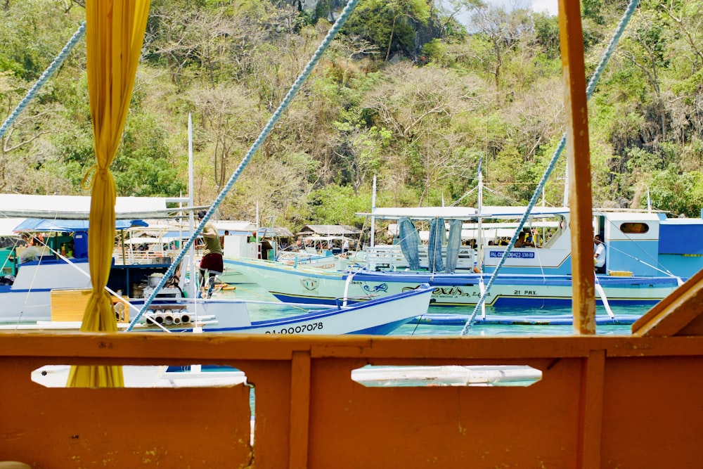 a group of boats docked at a dock