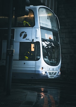 a double decker bus parked on the side of the road