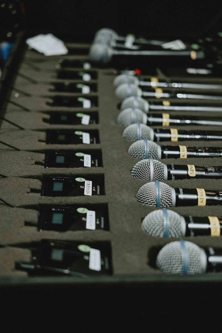 A row of press microphones on a table