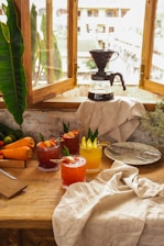 A cozy home kitchen scene with fresh vegetables and herbal tea, reflecting a healthy lifestyle.