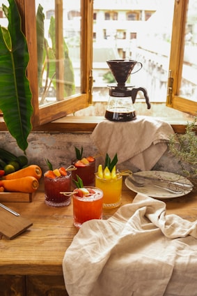 A cozy home kitchen scene with fresh vegetables and herbal tea, reflecting a healthy lifestyle.
