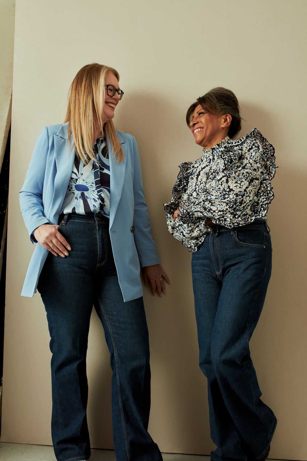 a couple of women standing next to each other