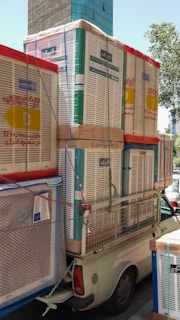 a truck with a bunch of boxes on the back of it