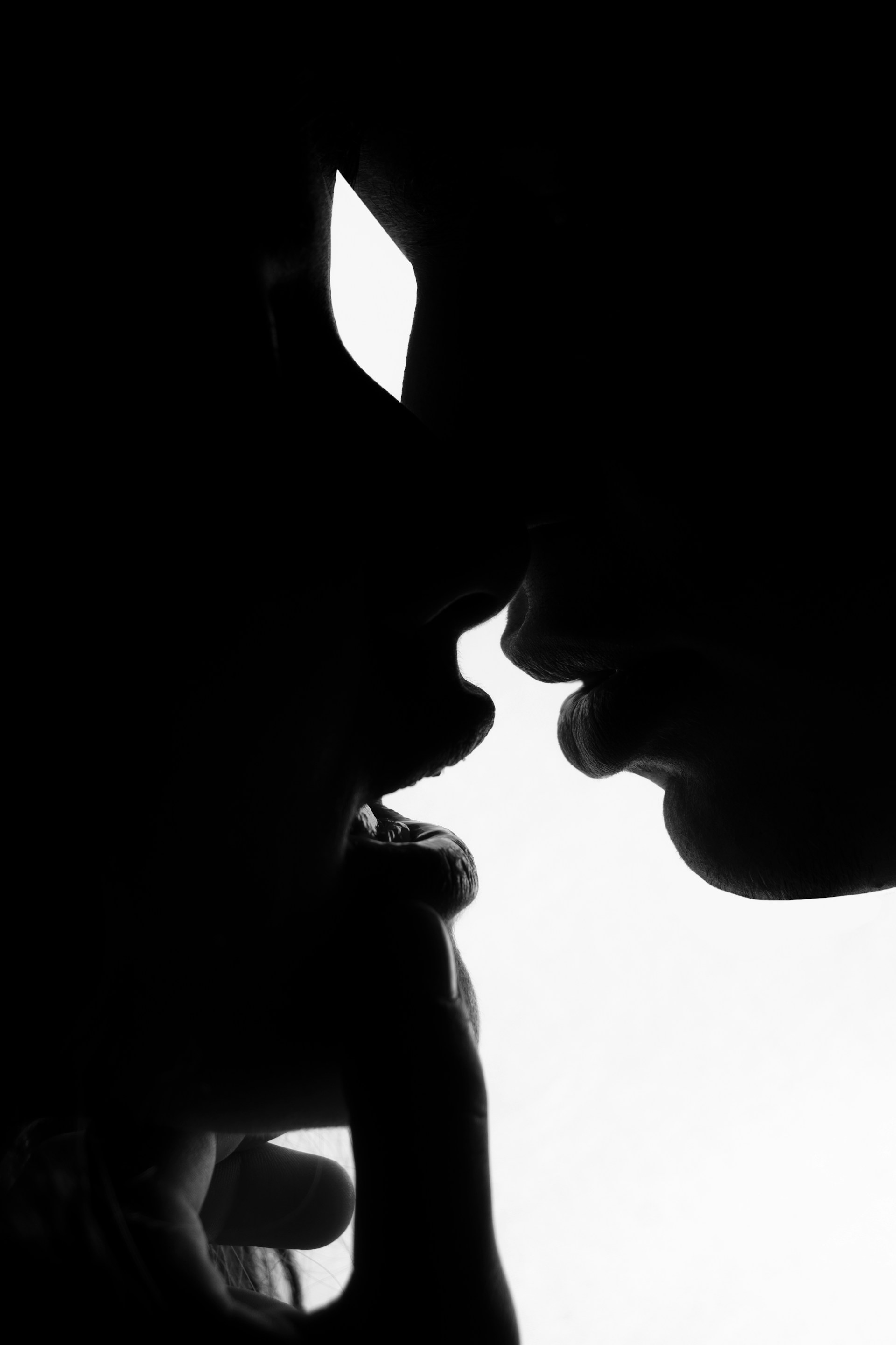 a couple of people that are kissing each other