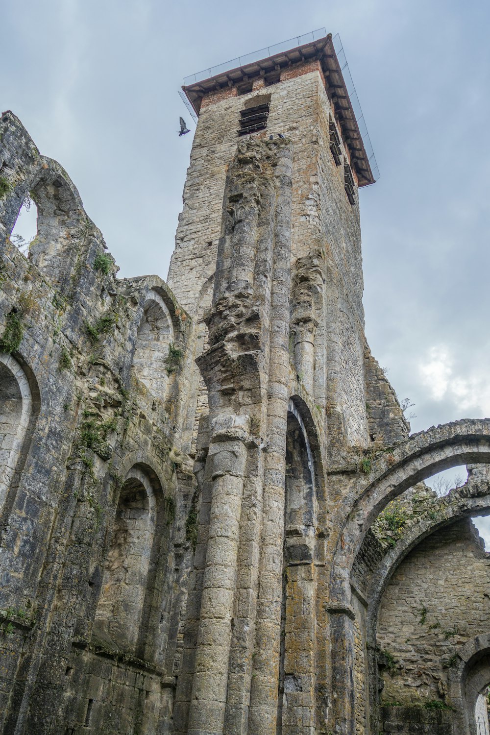 a tall tower with a clock on top of it