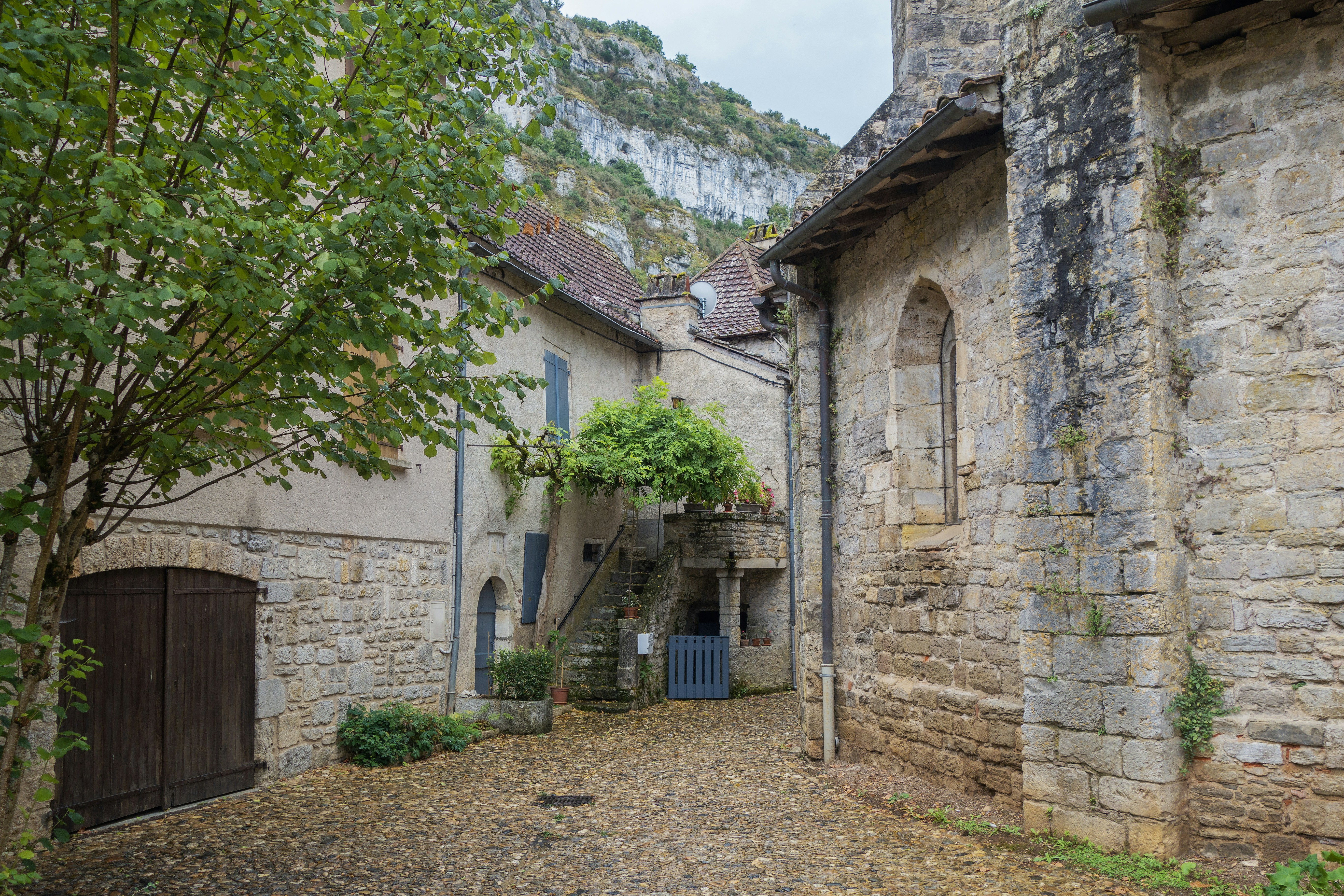 a cobblestone street in a small village