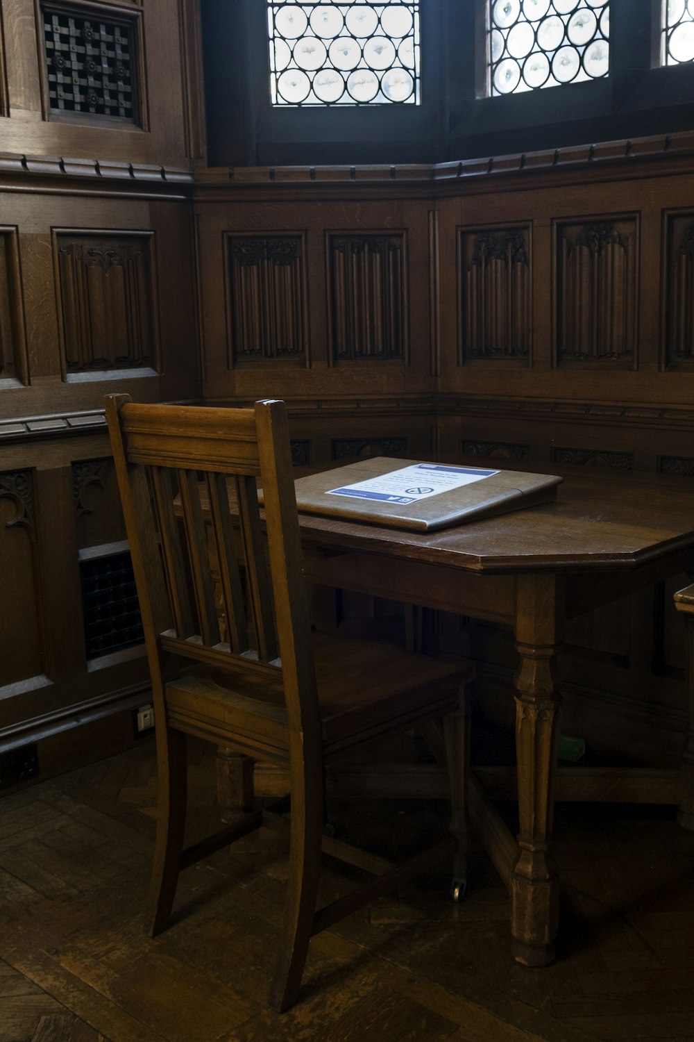 a wooden table with a book on top of it