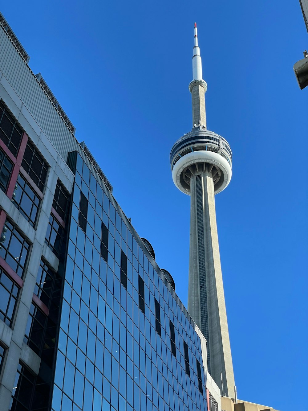 a very tall tower towering over a city