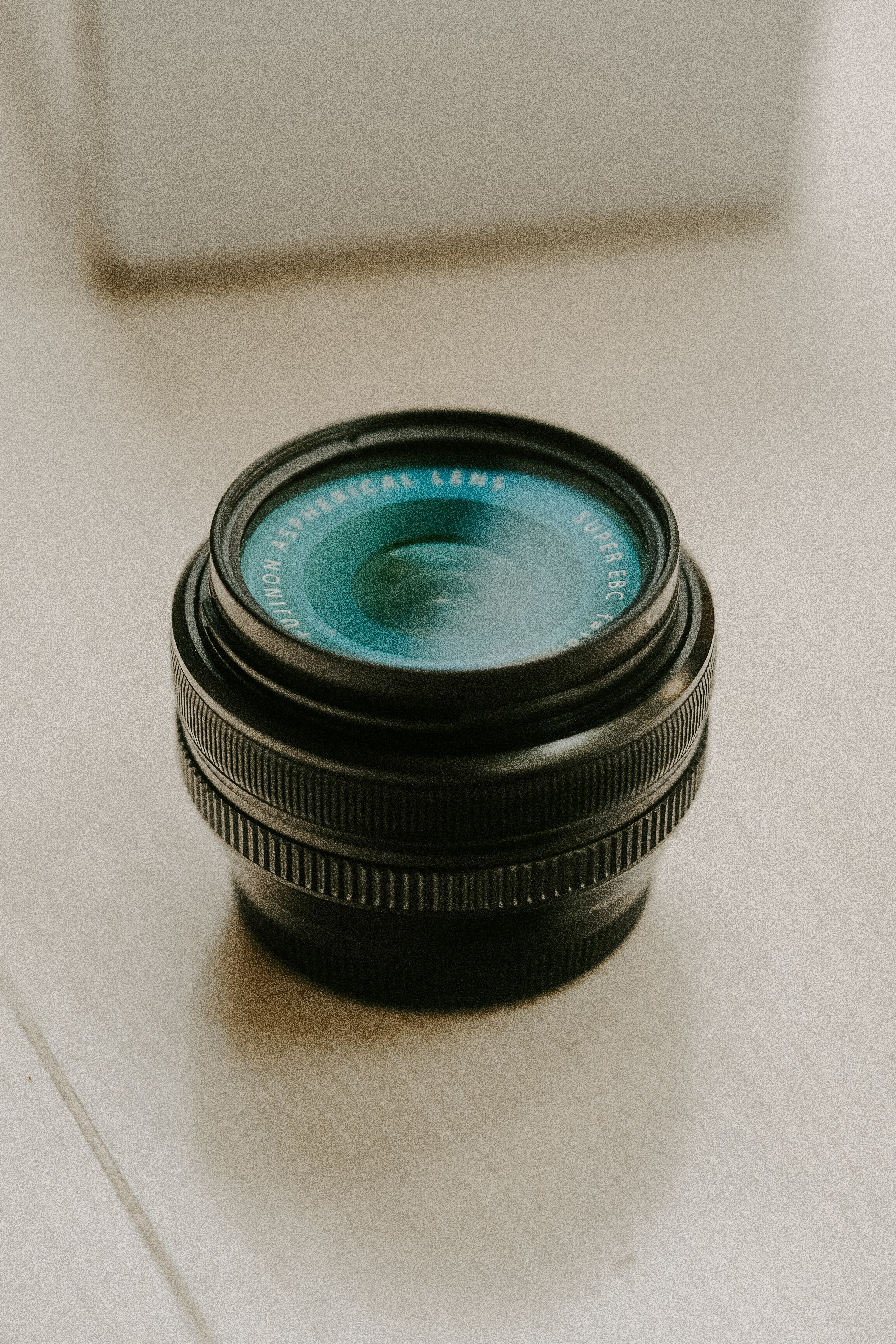 a close up of a camera lens on a table