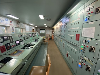 a control room filled with lots of electronic equipment