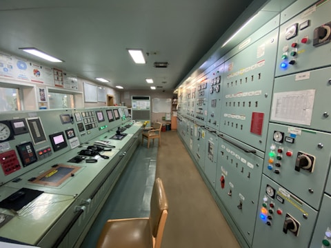 a control room filled with lots of electronic equipment